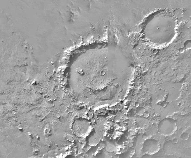 “Happy Face” Crater Greets MGS at the Start of the Mapping Mission